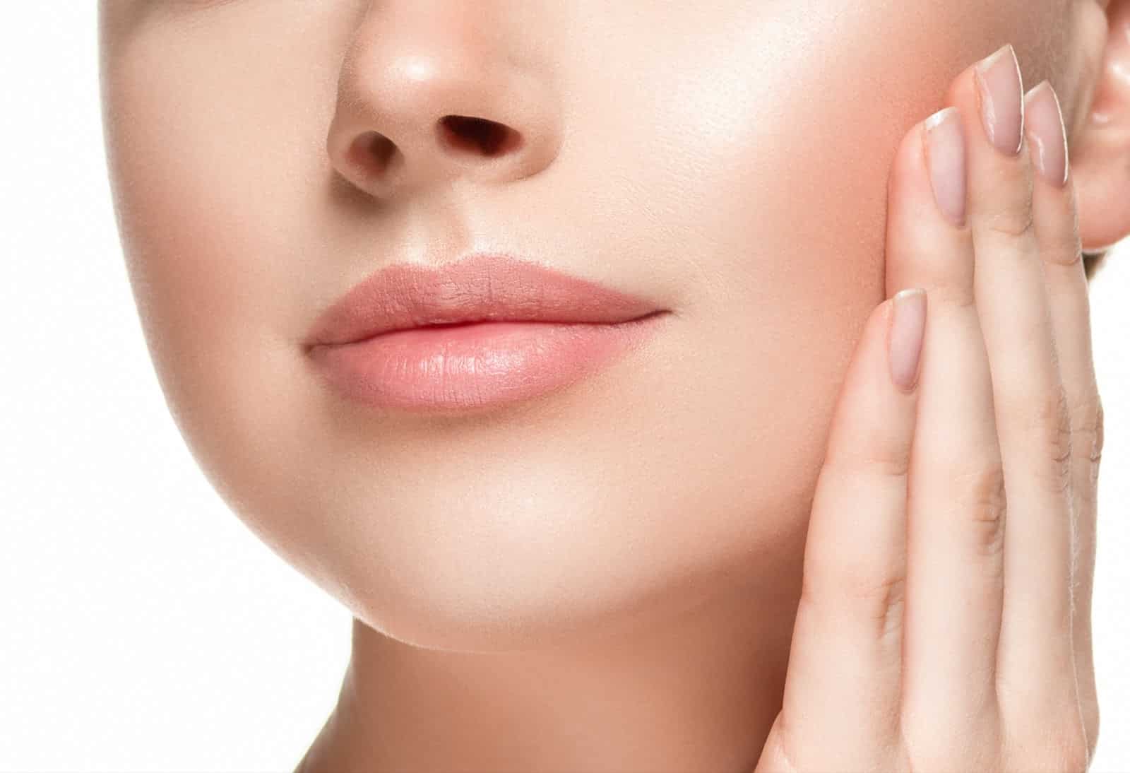 Demonstrating Uplifted Lip Corners Post Botox Treatment