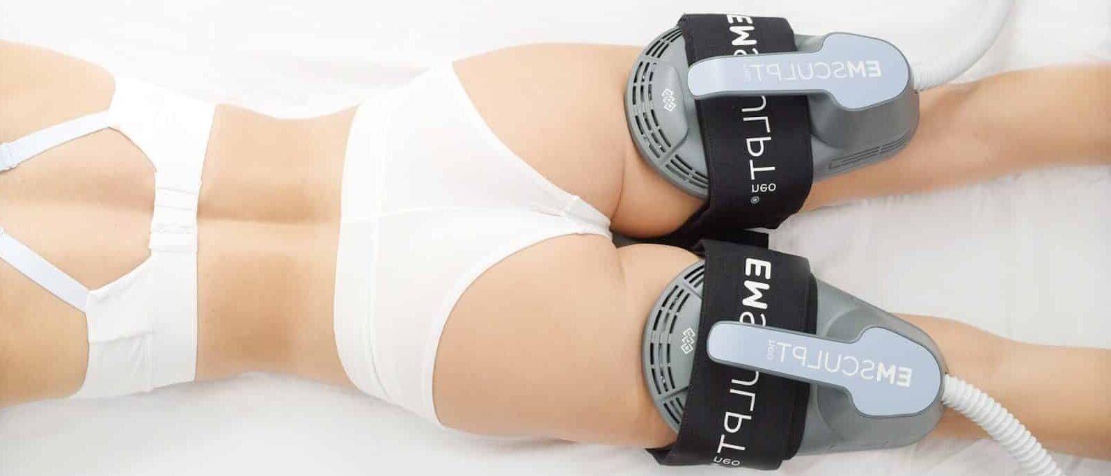 Woman Receiving Emsculpt Treatment On Her Buttocks, With Emsculpt Neo Placed On Her Skin.