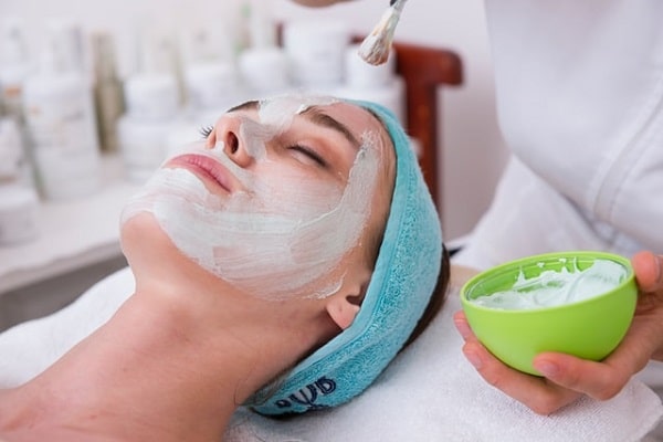 Practitioner Put Face Mask Before Chemical Peel Procedure