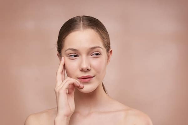 Woman Thinking To Do Chemical Peel Procedure