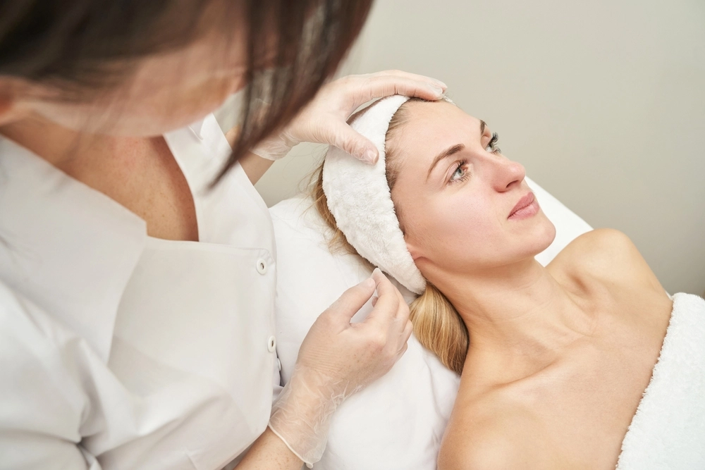 Cosmetologist-Inspecting-Skin-After-Restylane-Defyne-Treatment.