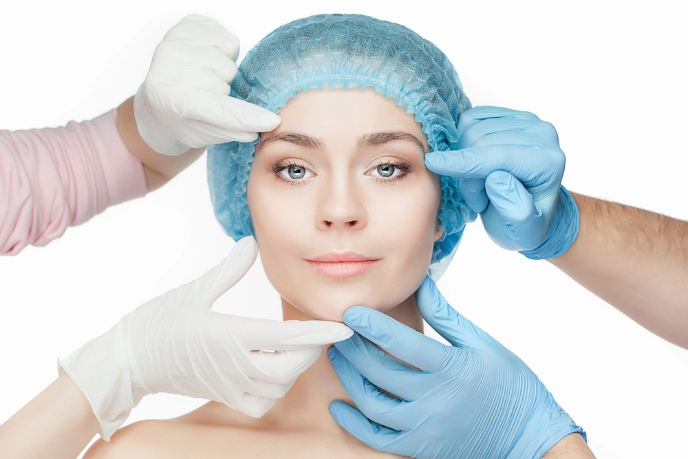 Potential patient receiving a facial evaluation for Xeomin injections in a clinical setting.